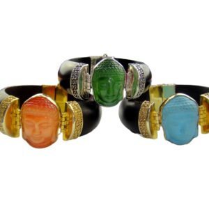 A group of three bracelets with different colored stones.