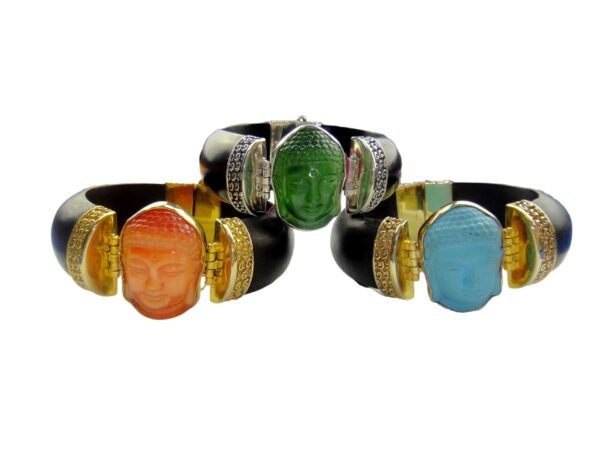 A group of three bracelets with different colored stones.