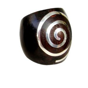 A wooden ring with silver swirls on it.
