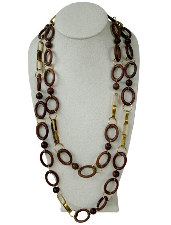 A Sonowood Link Necklace with wooden and golden beads displayed on a white mannequin bust.