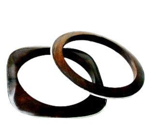 A pair of wooden bangles sitting on top of each other.