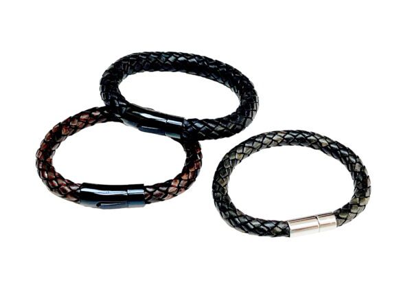 A group of three bracelets that are different colors.