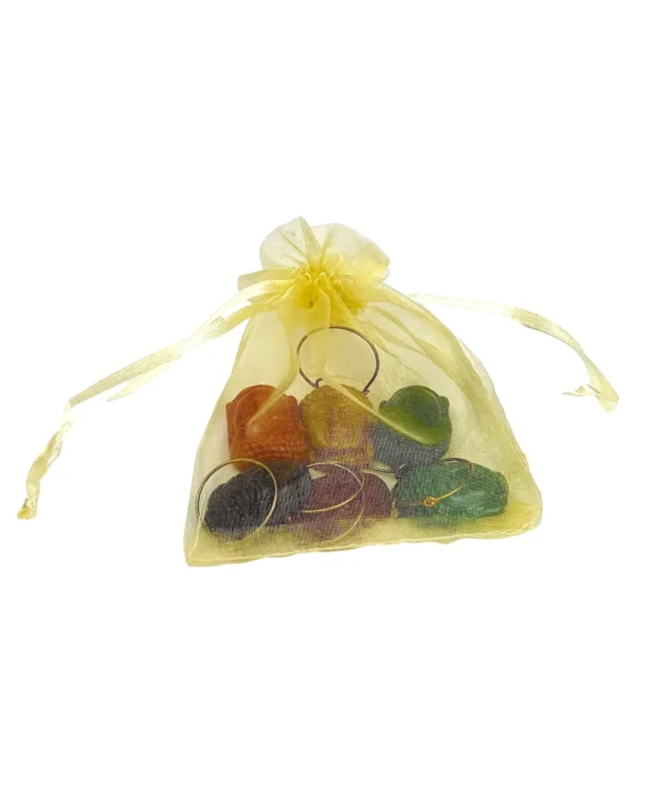 A yellow bag filled with different types of candy.