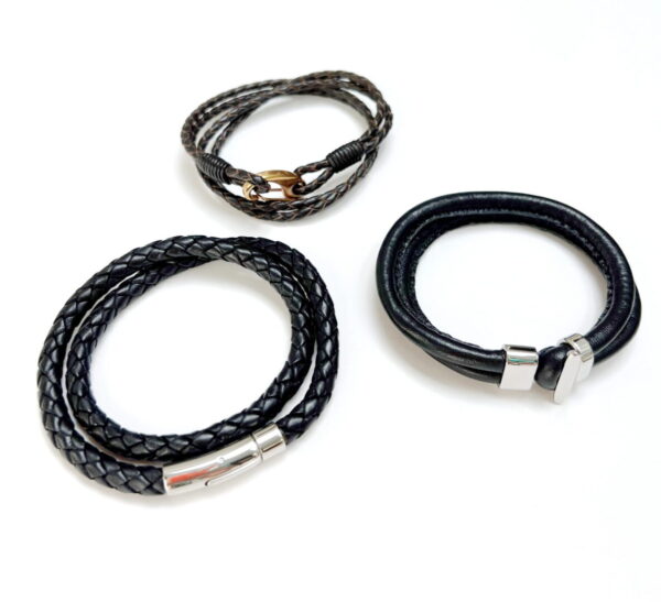 A couple of bracelets are laying on the ground