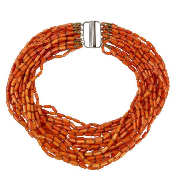 A necklace of orange beads with a silver clasp.