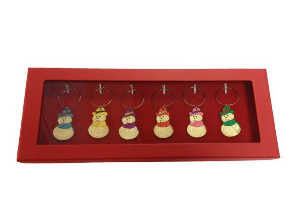 A red tray with seven snowmen on it.