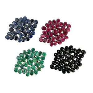 A group of four different colored stones.