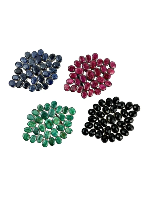 A group of four different colored stones.