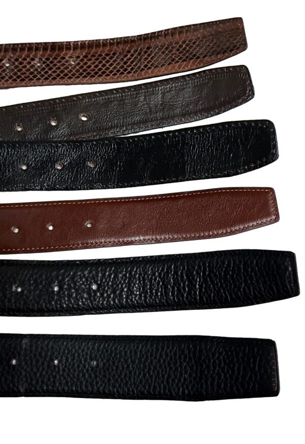 A close up of six different belts