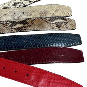 A close up of several different colored belts